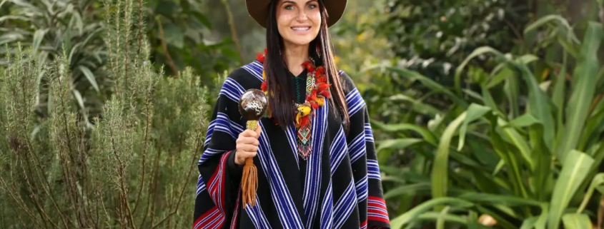 Jessy rattling wearing a poncho
